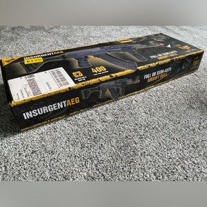 LIKE NEW!  (Only used once). Airsoft full or semi auto InsurgentAEG, 400fps